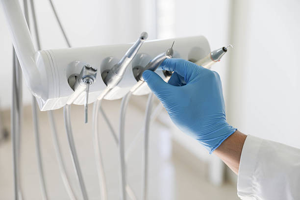 Professional Tooth Extraction technician working in Sargent, TX